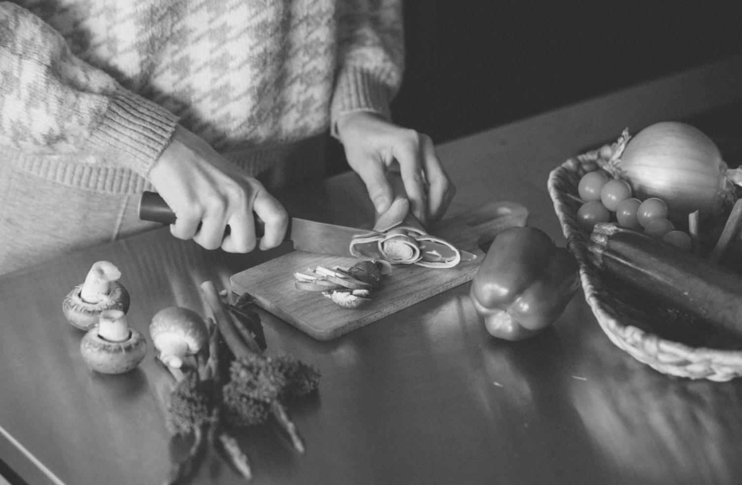 Chef creating an artistic culinary masterpiece with vibrant ingredients